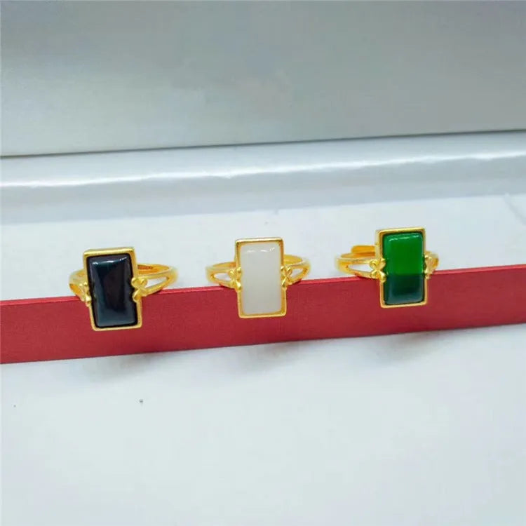 Adjustable brass ring with gold-plated finish and electroplated gemstone inlay