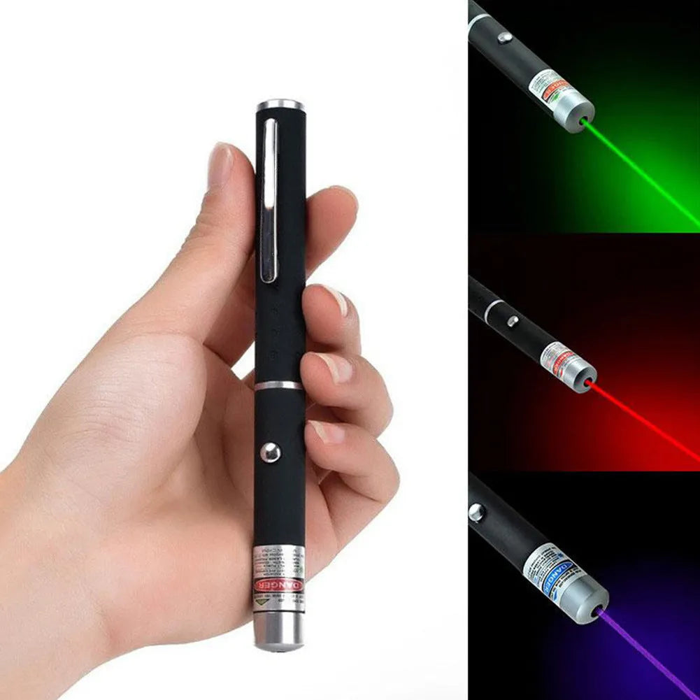 Black 5mW laser pointer pen with copper and aluminium body, red dot visible on distant surface