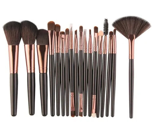 MAANGE 18 piece makeup brush set with fan brushes open next to its black roll-up case.