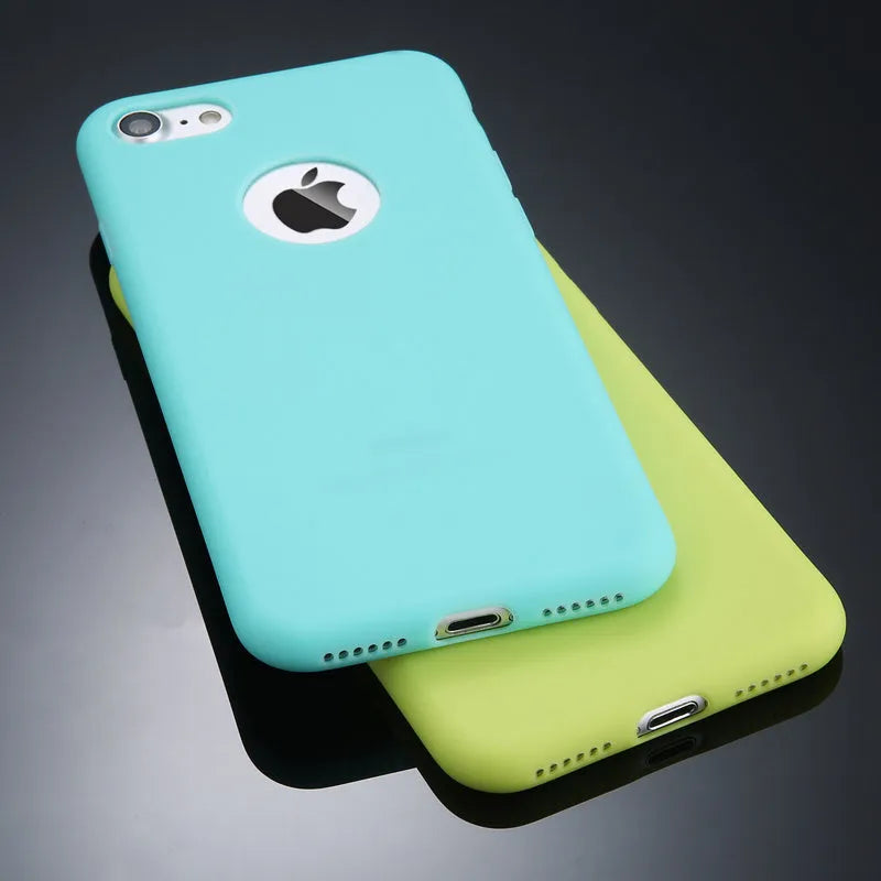 Soft silicone TPU phone case for iPhone in candy colours including pink, blue, and black.