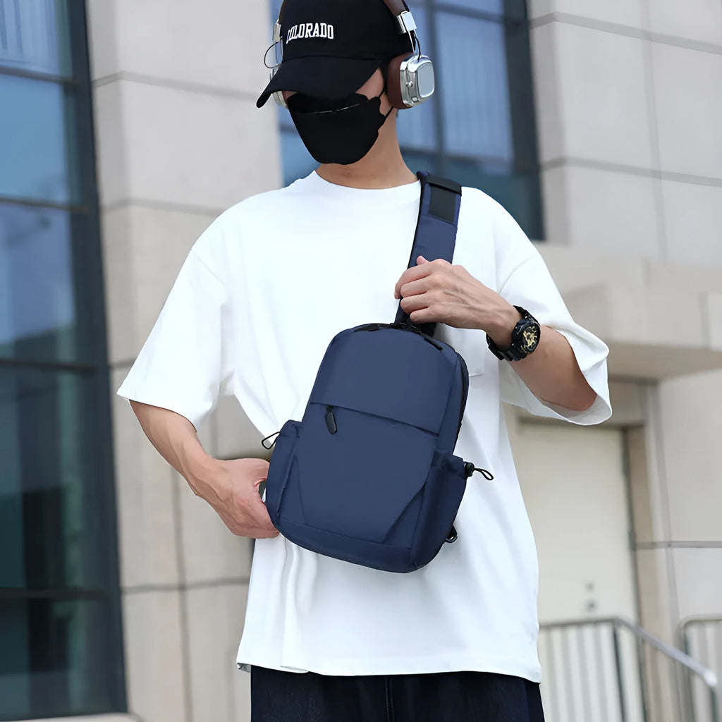 Men's lightweight large capacity chest bag in gray with waterproof agent-treated exterior and polyester lining