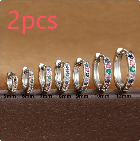 Circle zircon perforated stud earrings showing gold, rose gold and silver colour options with different diameter sizes