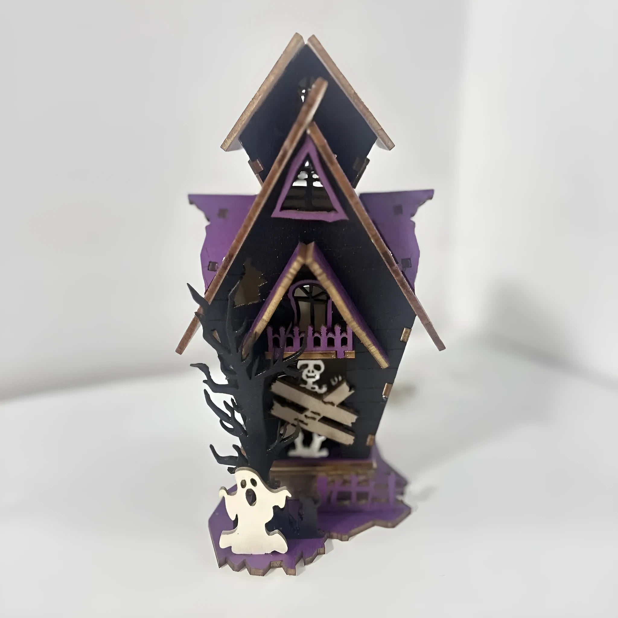 Unpainted wooden haunted house Halloween decoration measuring 14cm wide by 19cm tall
