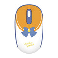 Pink Sailor Moon cartoon-themed wireless mouse with USB receiver on a desk.