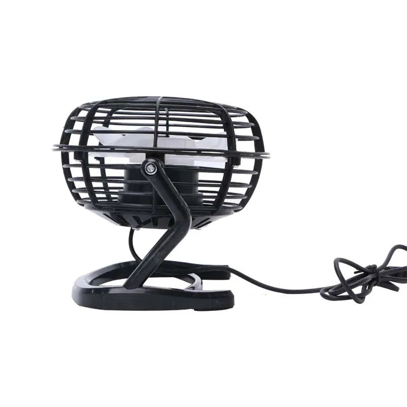 Mini black USB desk fan with adjustable angle for laptop cooling on wooden desk