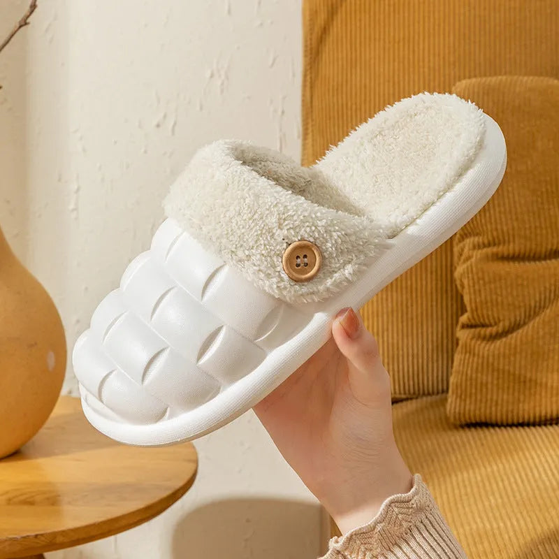 Women's pink and grey plaid detachable slippers with plush lining and a textured non-slip sole.