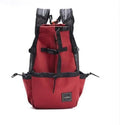 Ventilated pet travel backpack in black with mesh straps and safety buckle for cats and small dogs