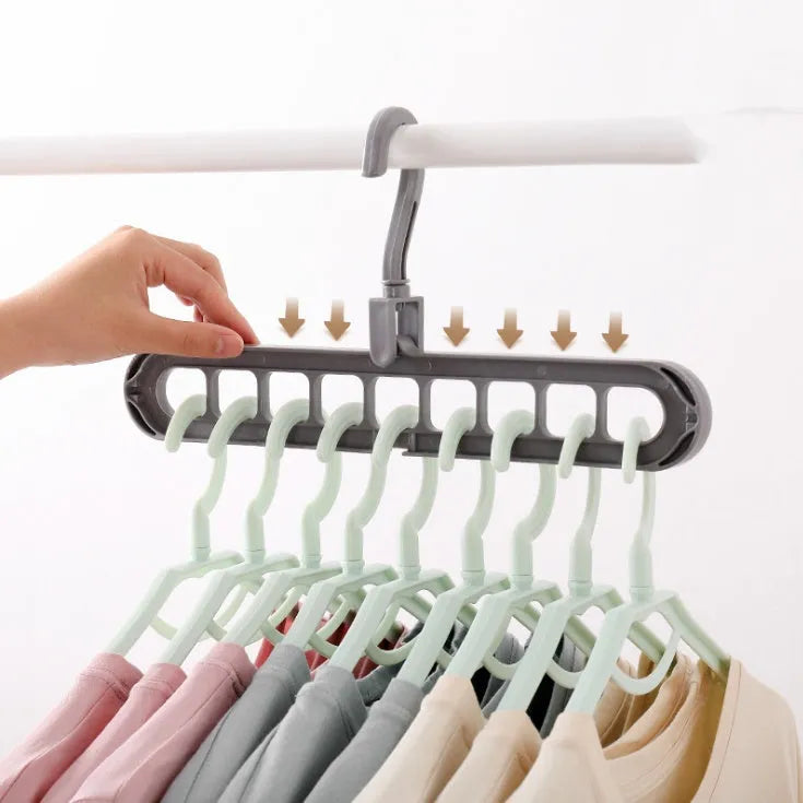 Plastic clothes hanger with 360 degree rotating hook, 33 cm long, available in pink, green, beige, grey, white, and grey