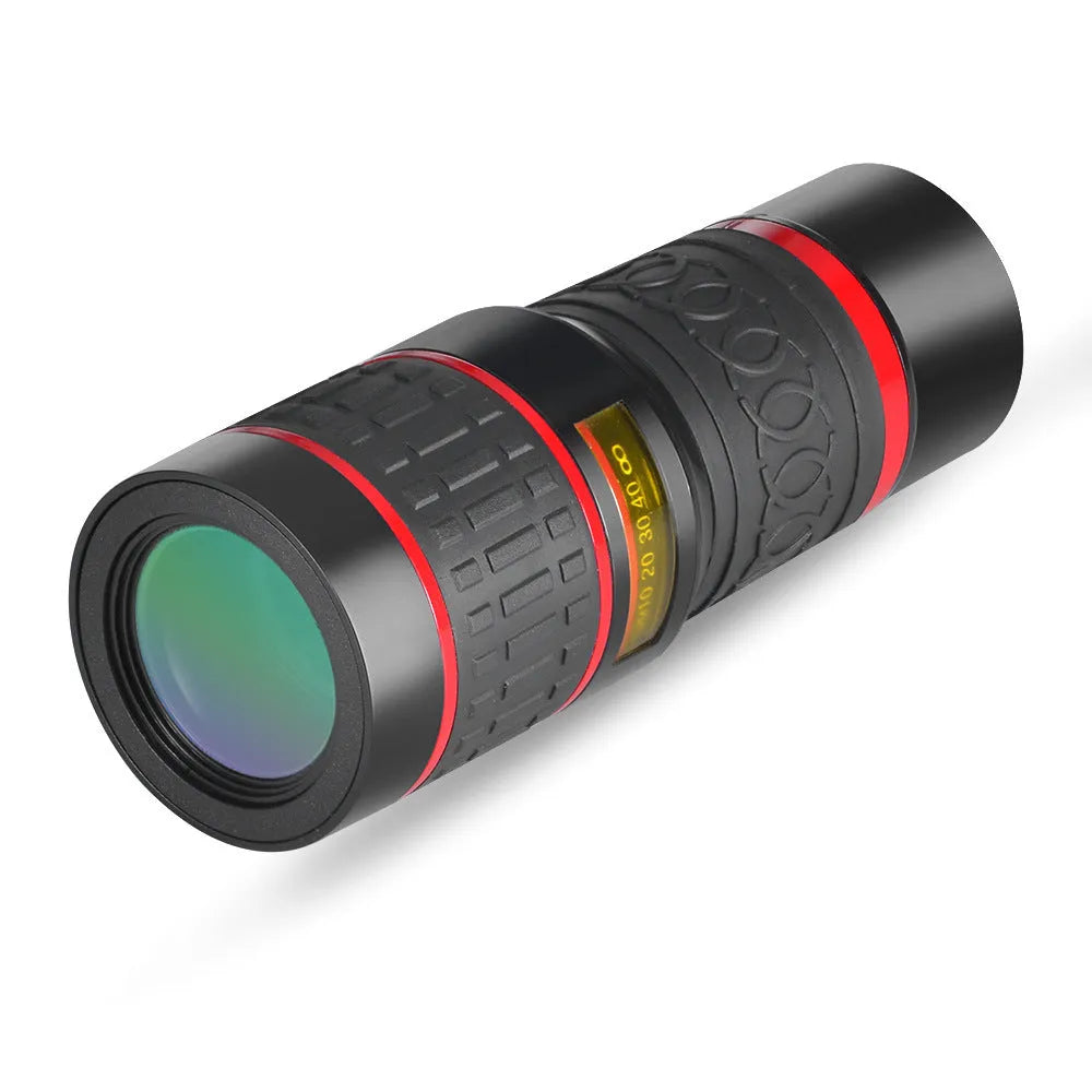 20x magnification smartphone telescope with universal mounting clip and plastic housing on a wooden table.