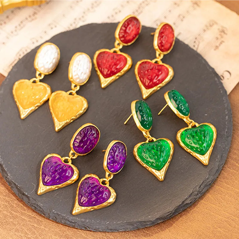 Silver needle pleated oval love heart alloy stud earrings in purple, red, green, and yellow-white.