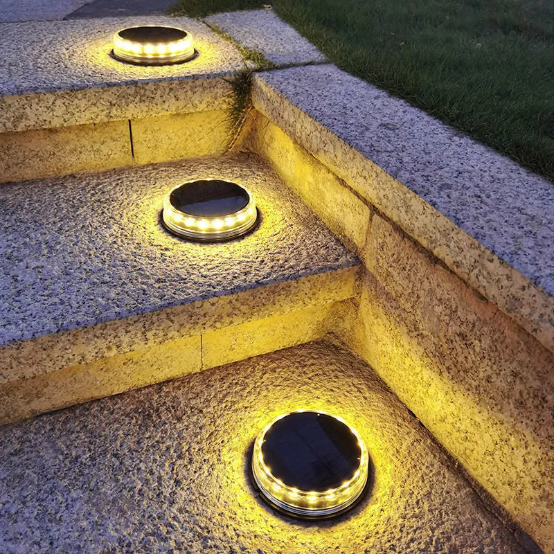 Solar buried light with 17 LED 2835 chips and polycrystalline panel in outdoor lawn setting