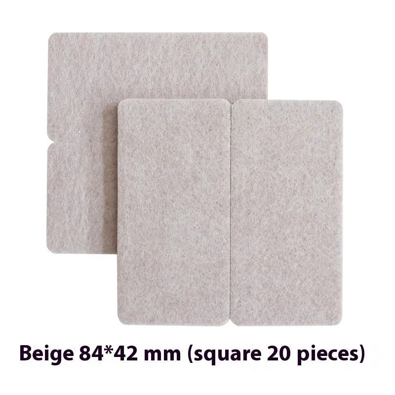 Beige plastic furniture leg protection pads in round and square shapes on wooden floor