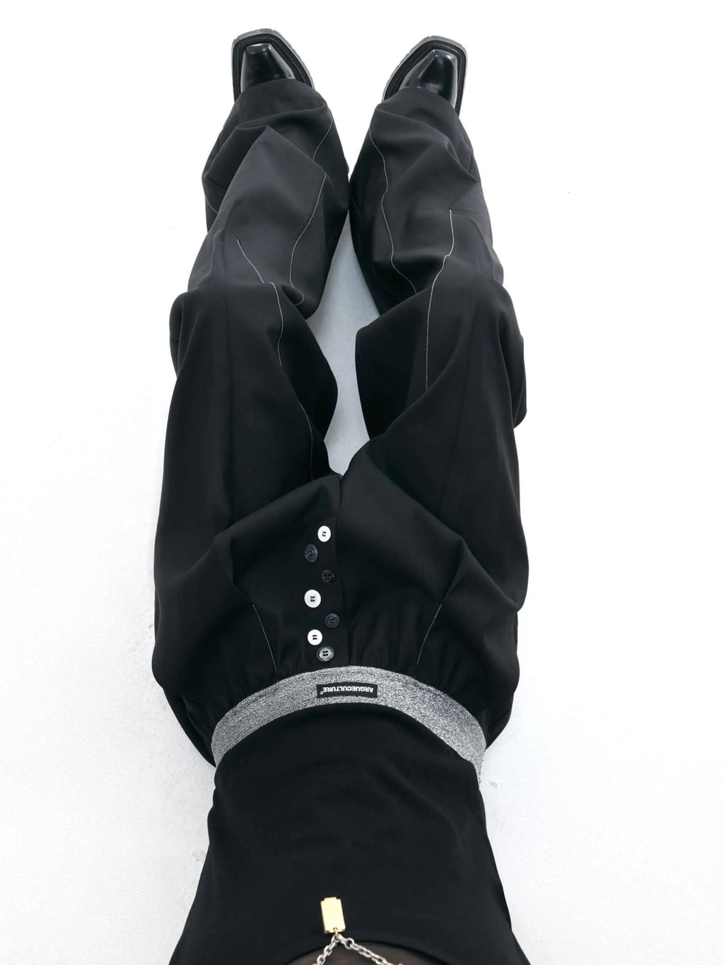 Straight-leg high-waist casual trousers with button-fly design in black or grey colour