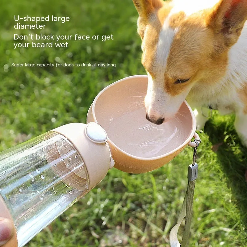 Portable dog water bottle with food storage compartment in yellow colour for outdoor travel