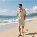 Men's linen blend short sleeve shirt and shorts beach suit set in light blue.