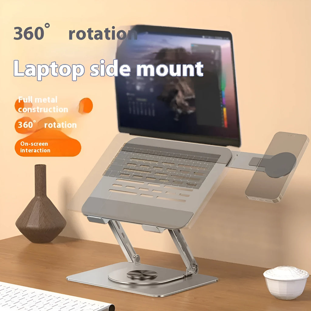 Silver carbon steel laptop stand with rotating base and side-mounted magnetic phone holder for devices up to 17 inches