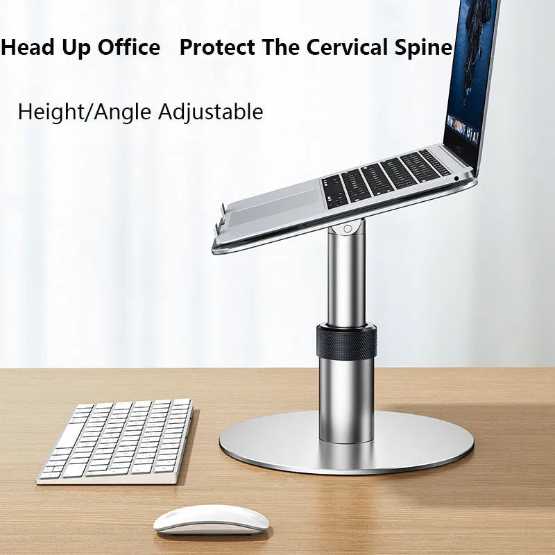 Silver aluminium car laptop stand with adjustable height and a 360-degree rotating base on a car seat.