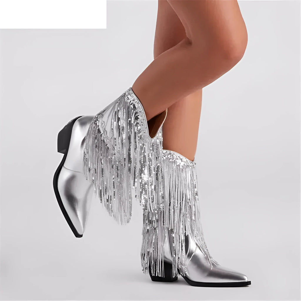 Women's black PU leather chunky heel boots with tassel decoration and a pointed toe on a stiletto heel.