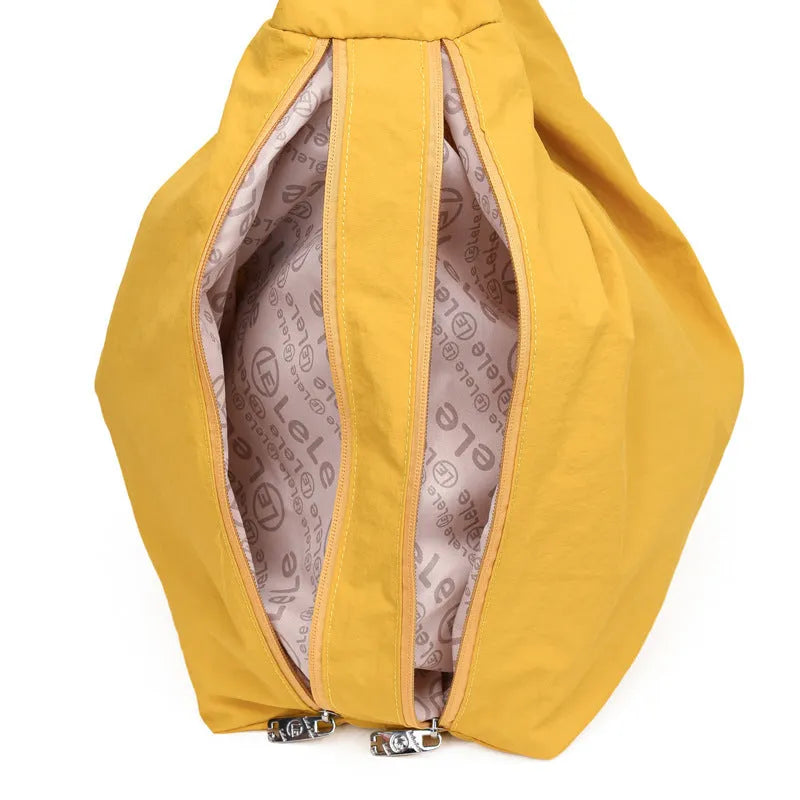 Women's heart-shaped nylon underarm bag in black, yellow, khaki and blue colour options