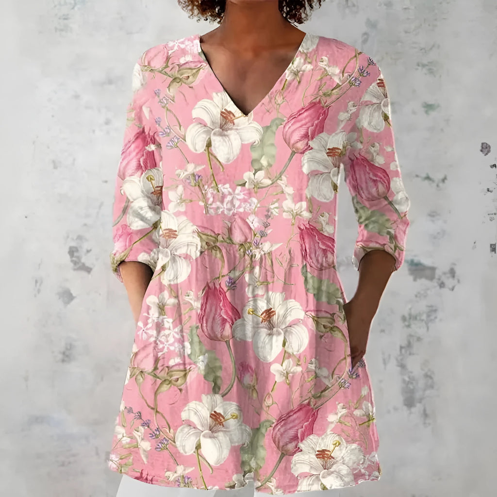 Women's retro-style slim fit long-sleeved top with a printed pattern, shown in one of twelve available colours.
