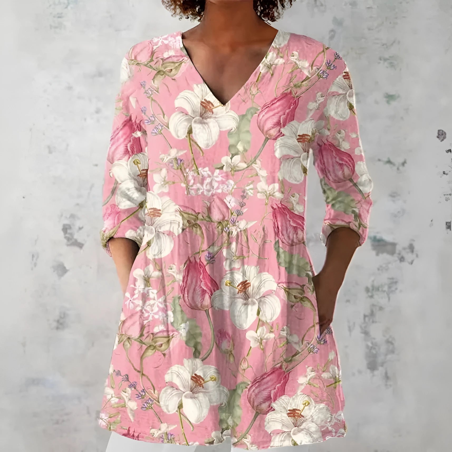 Women's retro-style slim fit long-sleeved top with a printed pattern, shown in one of twelve available colours.