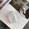White marble crack pattern hard plastic protective case for Apple AirPods 1 and 2 charging box.
