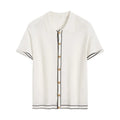 White short sleeve cardigan with dark contrast trim on the lapels.