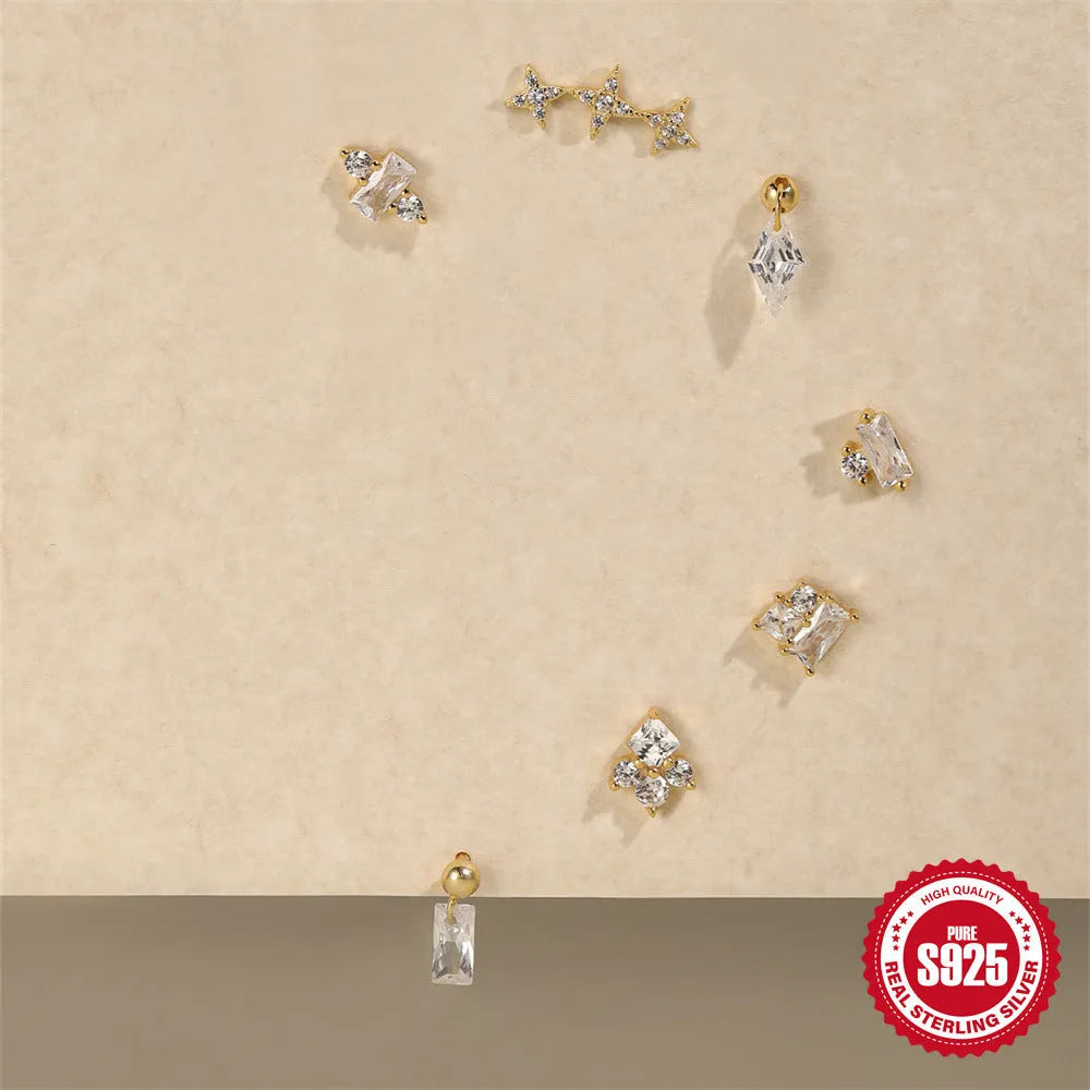 S925 sterling silver flower stud earrings with red square gravel stones and gold electroplating.