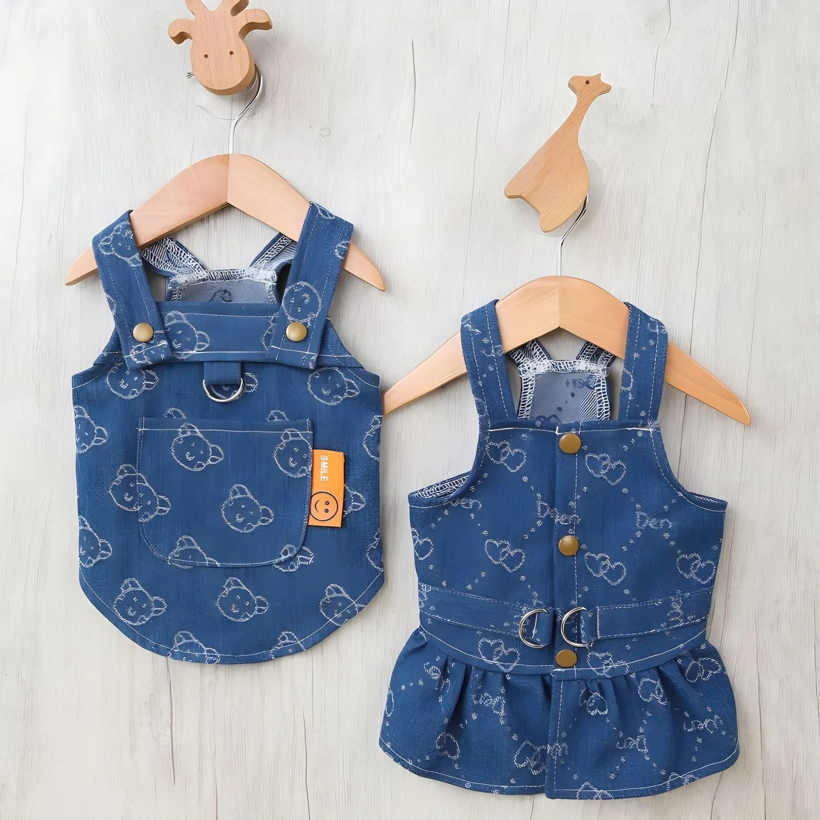 Small dog wearing denim princess dress with bracket skirt design