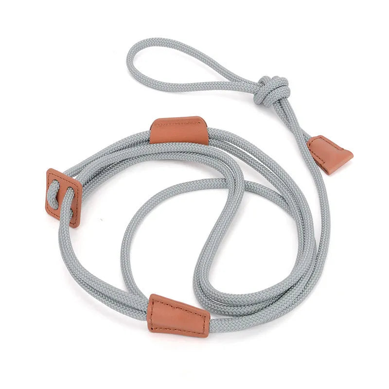 Chest-back dog leash in synthetic silk nylon and cowhide, 143cm long, six monochrome colours available