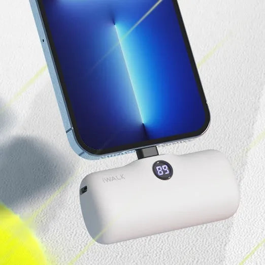 Lipstick-shaped portable power bank in multiple colours showing digital display and charging ports