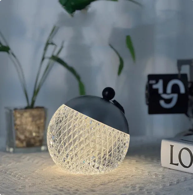 Portable dimmable LED desk lamp in chrome finish with touch control, 12cm diameter