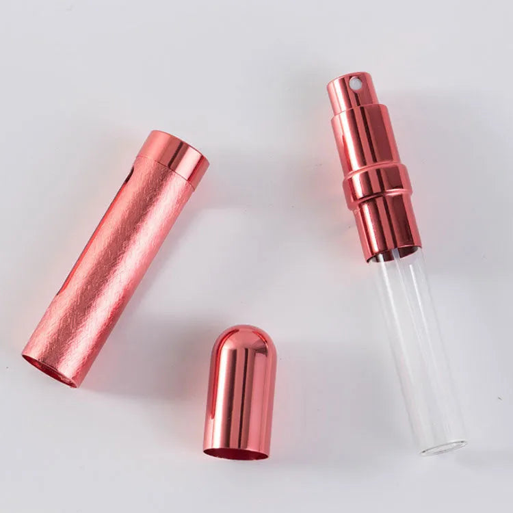 12ml aluminium portable perfume bottle atomiser in six colour options shown next to a ruler for scale.