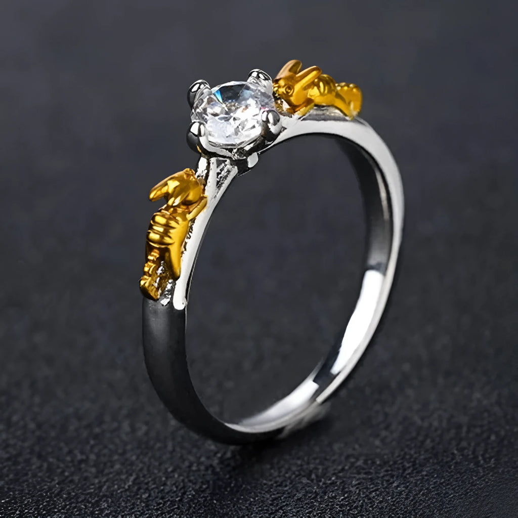 Copper crown crystal ring with black gold finish showing sizing options