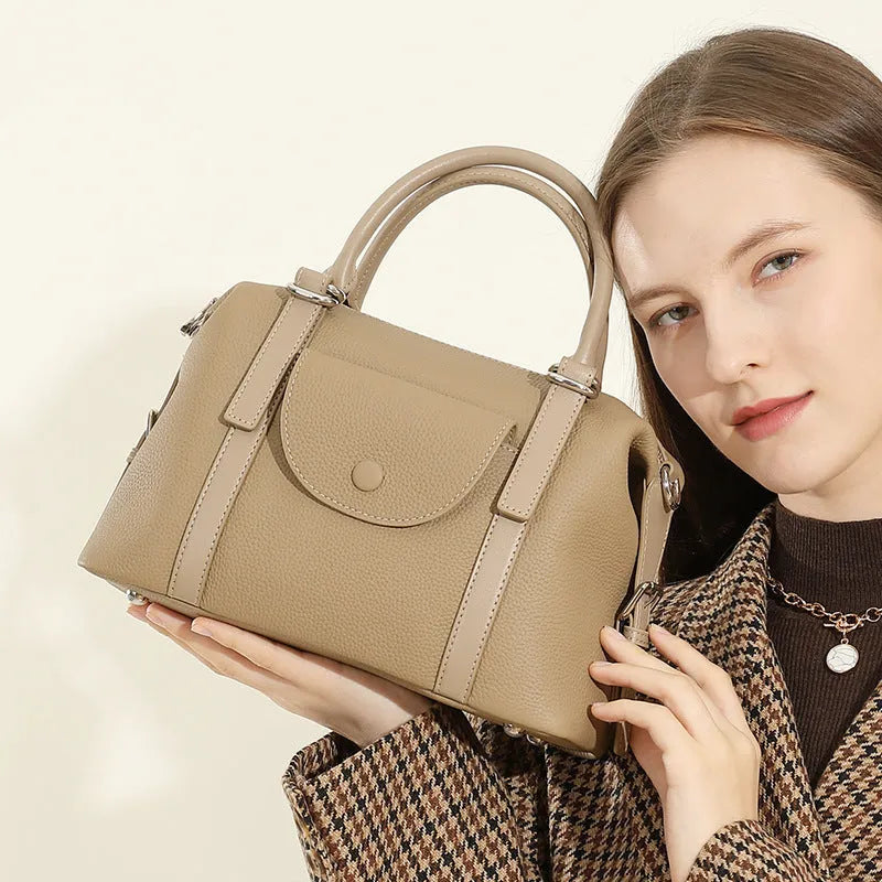 Genuine leather women's handbag in black, grey, or brown with contrast stitching