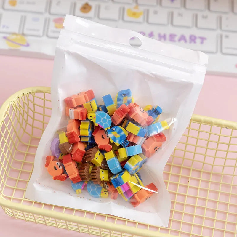 50 small colourful cartoon novelty erasers including fruit and animal shapes in a pearlescent film bag.