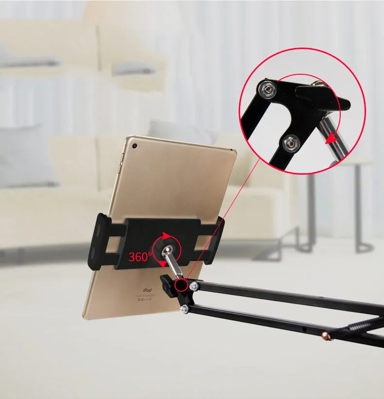 Support phone tablet stand in black on a desk, holding a smartphone for hands-free viewing