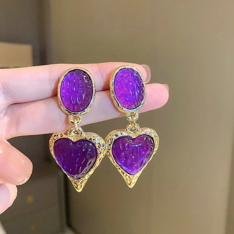 Silver needle pleated oval love heart alloy stud earrings in purple, red, green, and yellow-white.