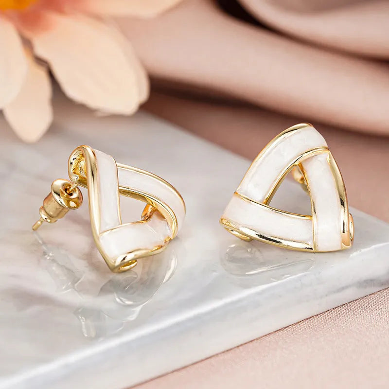 Women's yellow gold geometric triangle stud earrings with inlaid zircon on copper base