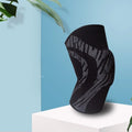 Men's black nylon basketball knee pad showing compression sleeve design for knee protection.