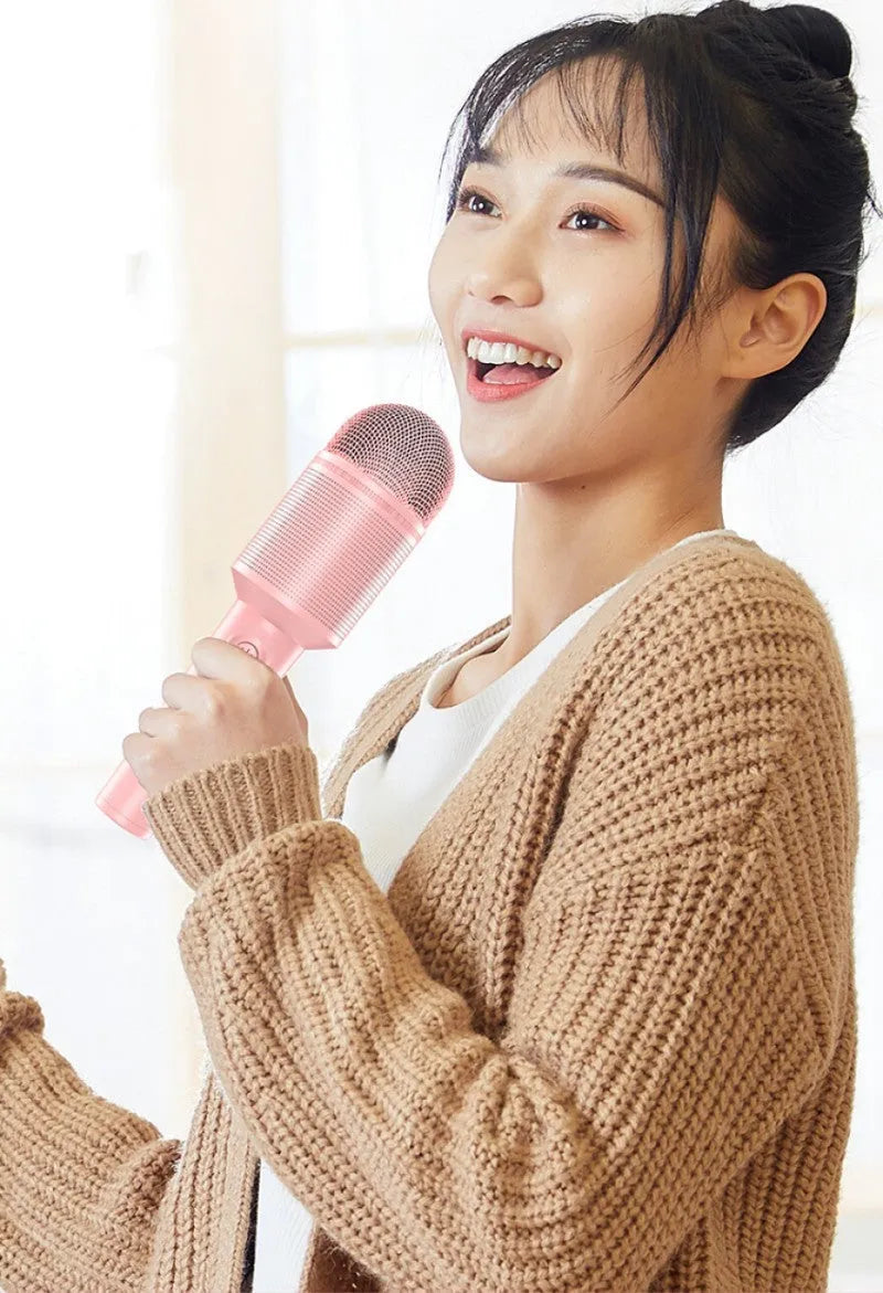 Wireless Bluetooth karaoke microphone in girly pink, sapphire blue, and mint green colour options.