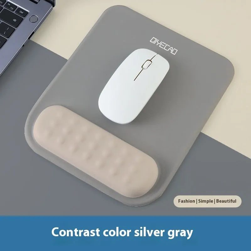 Ergonomic cloth silicone mouse pad with built-in wrist rest in a choice of colours.