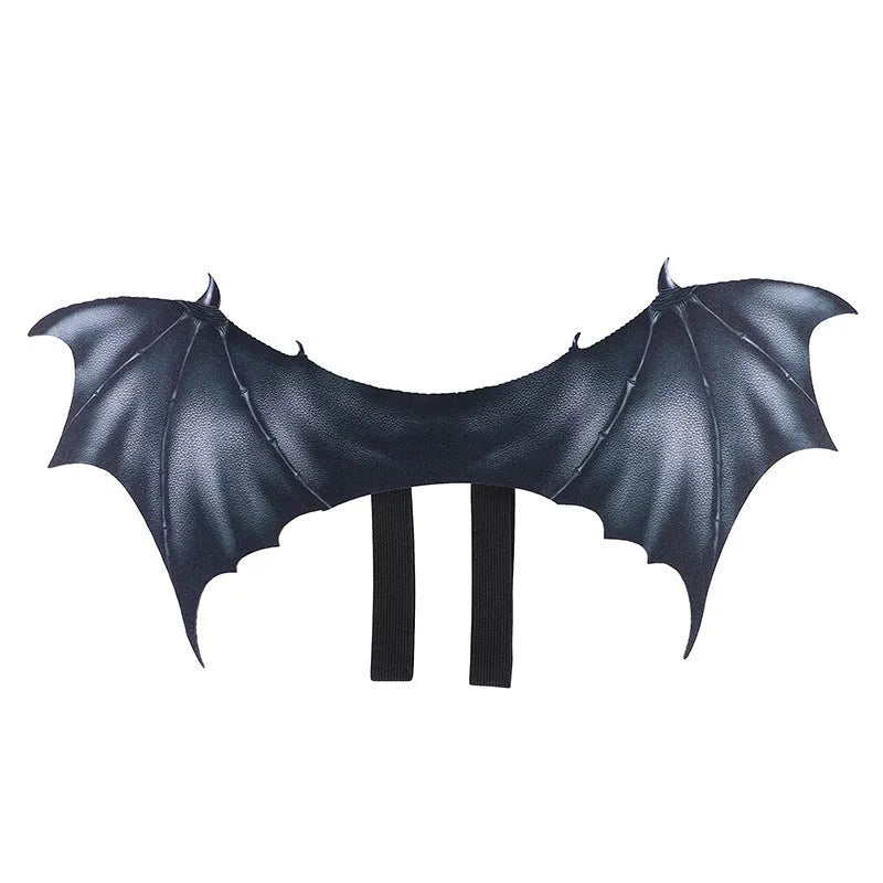 Black cloth bat wing costume for dogs and cats on a Halloween background.