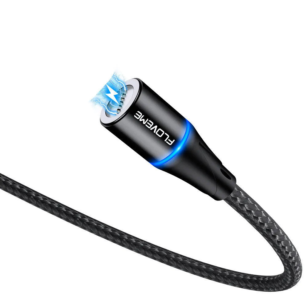 Black magnetic data cable with USB-C connector and side LED light, laid flat next to its aluminium foil packaging.