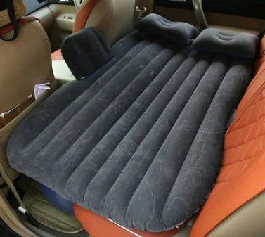 Car inflatable bed with ultra-thickened 0.5mm flocking cloth in Black Wave colour, shown inflated in rear of five-seater car