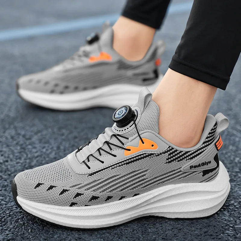 Men's low-top sports shoes with fly-knit mesh upper and rotating buckle fastening in black colour
