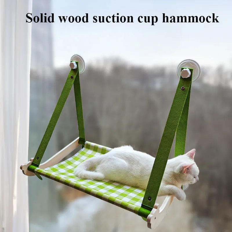 Cat window hammock with wooden frame and linen fabric, secured by four suction cups, in pink colour option