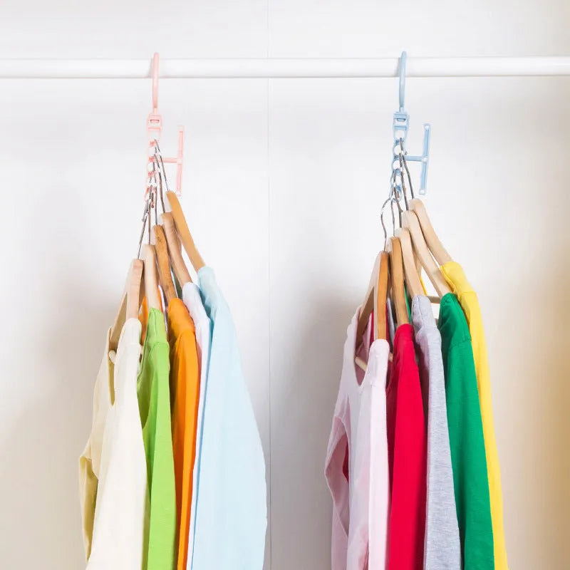 Blue revolving wardrobe hanger with five arms and a top handle on a white background