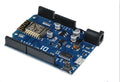 Black ESP8266 Wi-Fi development board with pin headers, compatible with Arduino IDE.