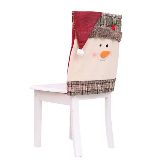 Christmas chair set with Santa Claus and Snowman covers and red Santa hat on standard dining chairs